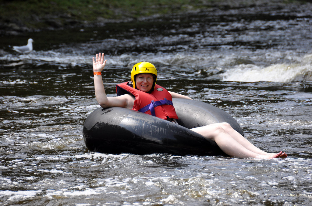 Tubing Near Wisconsin Dells helmet and life jacket are essential